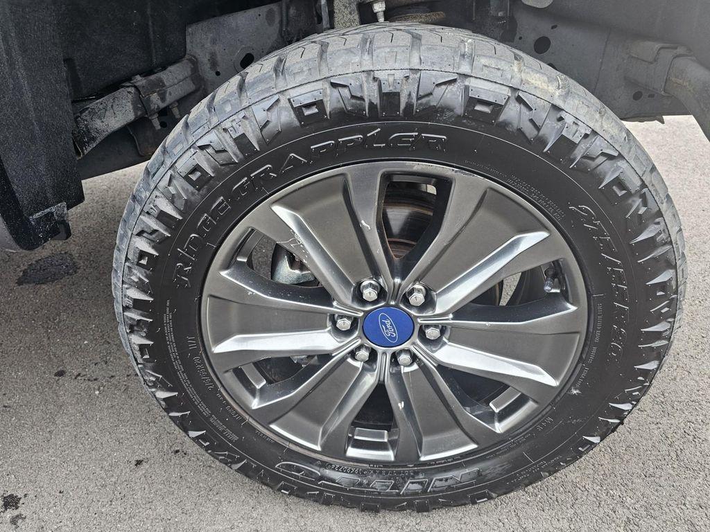 used 2018 Ford F-150 car, priced at $23,465