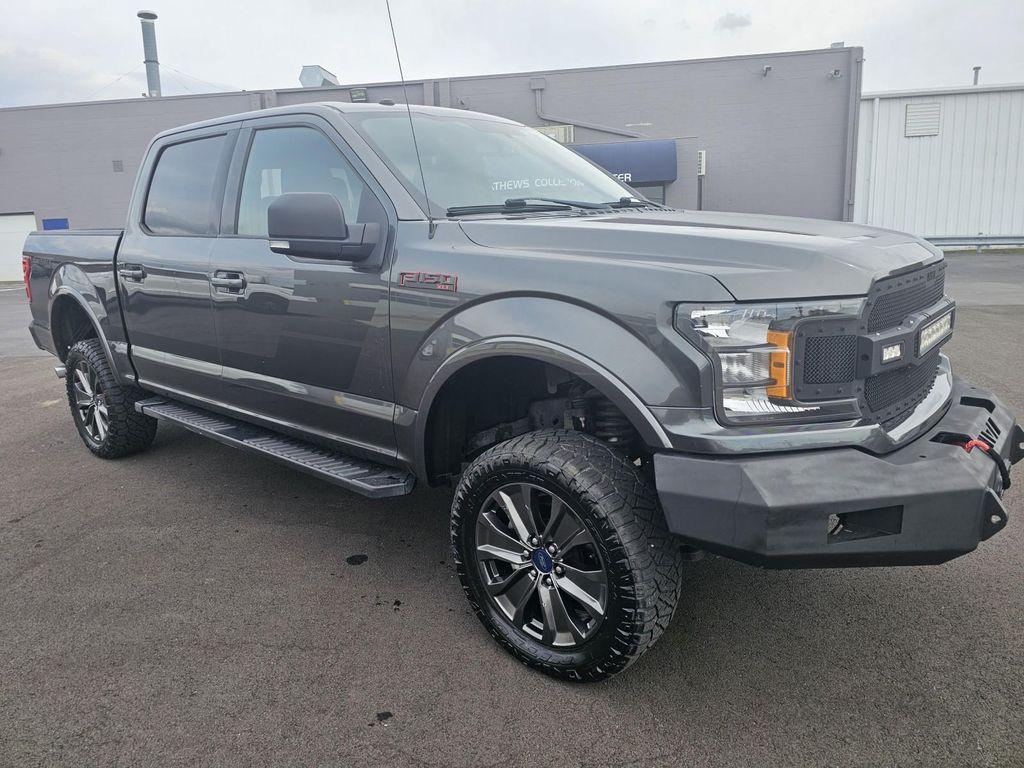 used 2018 Ford F-150 car, priced at $23,465