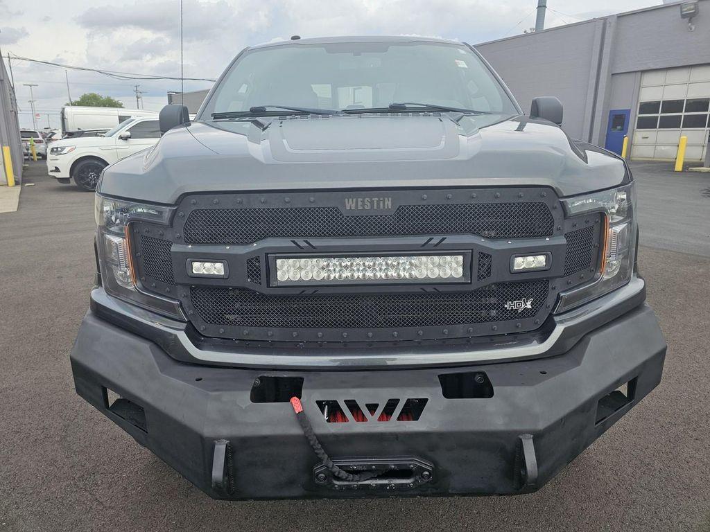 used 2018 Ford F-150 car, priced at $23,465