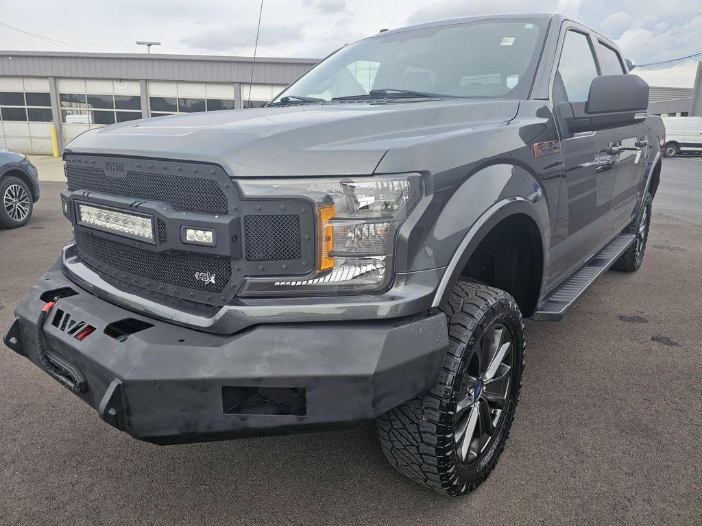 used 2018 Ford F-150 car, priced at $23,465