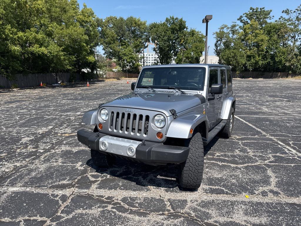 used 2013 Jeep Wrangler Unlimited car, priced at $13,500