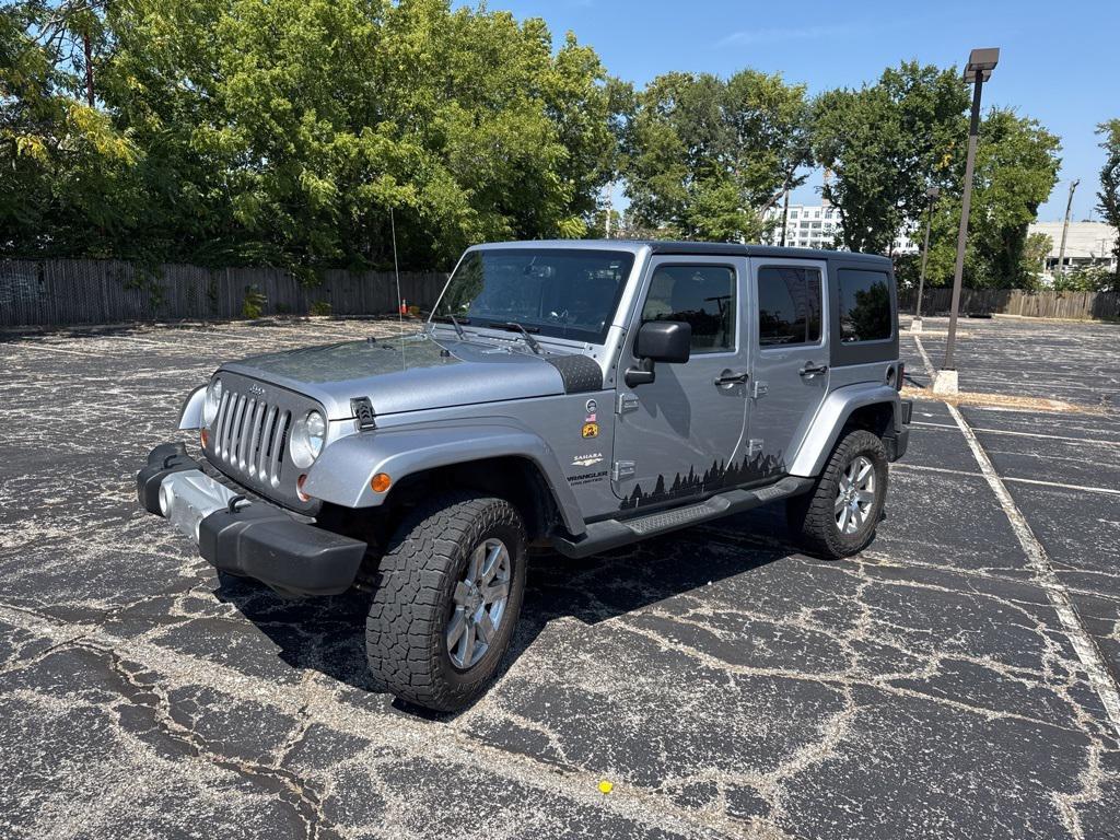 used 2013 Jeep Wrangler Unlimited car, priced at $13,500