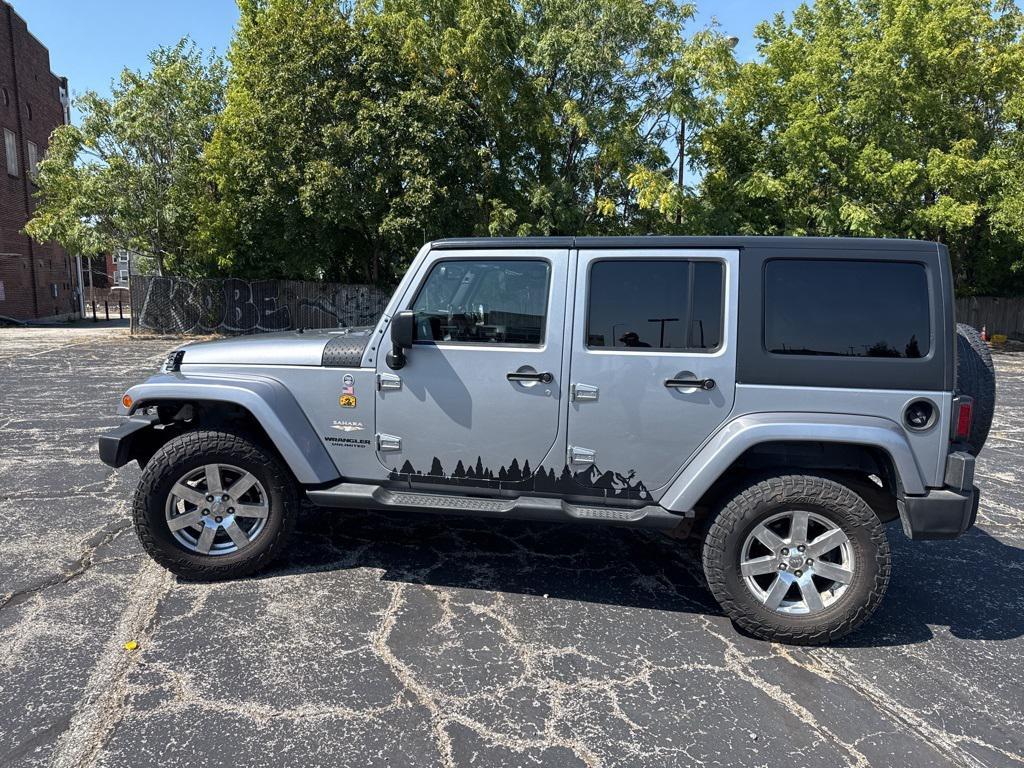used 2013 Jeep Wrangler Unlimited car, priced at $13,500