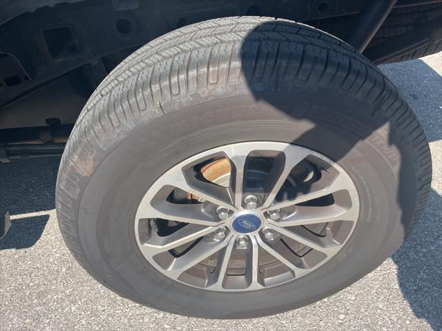 used 2016 Ford F-150 car, priced at $15,000