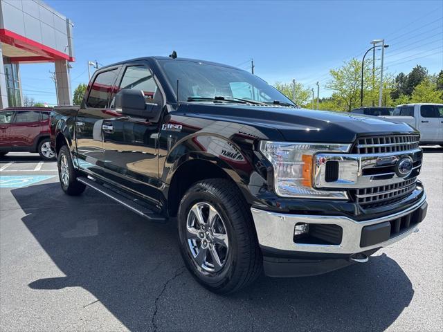 used 2018 Ford F-150 car, priced at $26,461