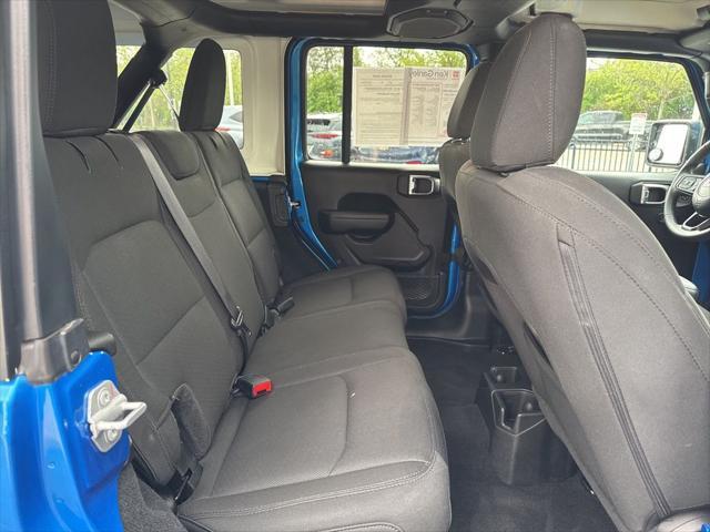 used 2023 Jeep Wrangler car, priced at $29,891