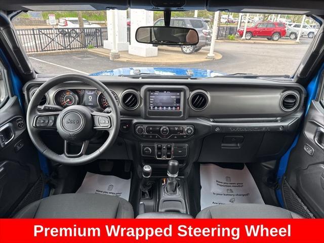 used 2023 Jeep Wrangler car, priced at $28,191
