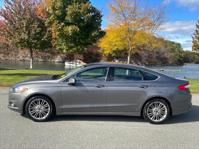 used 2013 Ford Fusion car, priced at $10,285