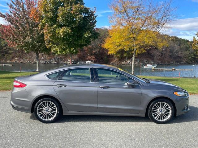 used 2013 Ford Fusion car, priced at $10,285