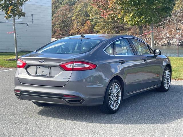 used 2013 Ford Fusion car, priced at $10,285