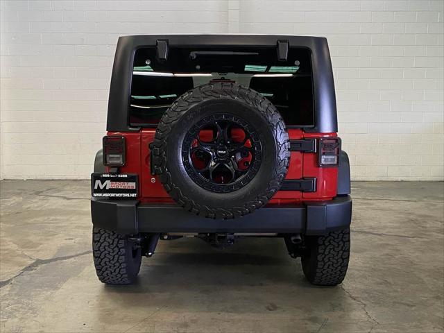 used 2011 Jeep Wrangler Unlimited car, priced at $22,998