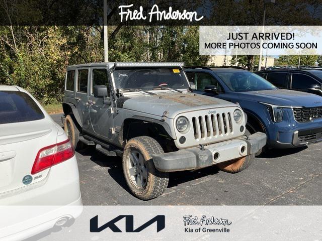 used 2012 Jeep Wrangler Unlimited car, priced at $14,956