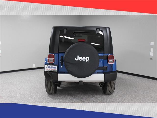 used 2010 Jeep Wrangler Unlimited car, priced at $14,000