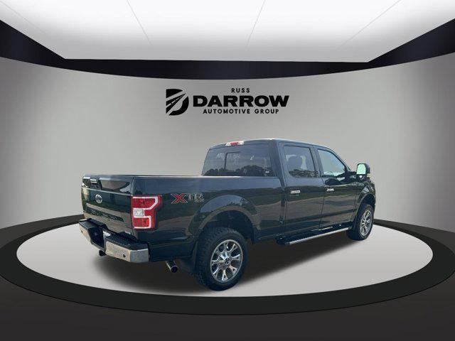 used 2018 Ford F-150 car, priced at $28,099