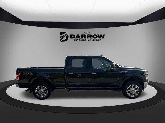 used 2018 Ford F-150 car, priced at $28,099