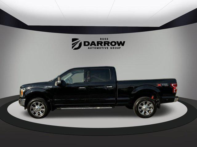 used 2018 Ford F-150 car, priced at $28,099