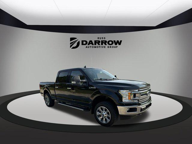 used 2018 Ford F-150 car, priced at $28,099