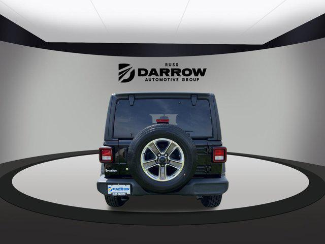 used 2021 Jeep Wrangler Unlimited car, priced at $31,601