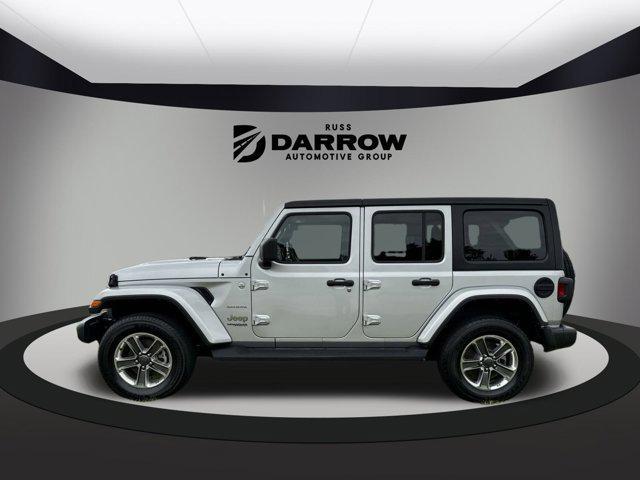 used 2022 Jeep Wrangler Unlimited car, priced at $28,252