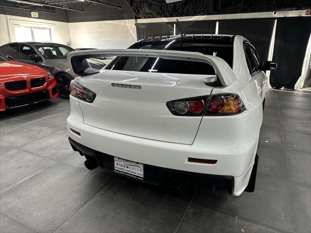 used 2013 Mitsubishi Lancer Evolution car, priced at $31,988