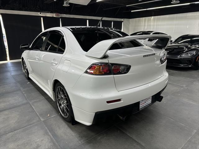 used 2013 Mitsubishi Lancer Evolution car, priced at $31,988