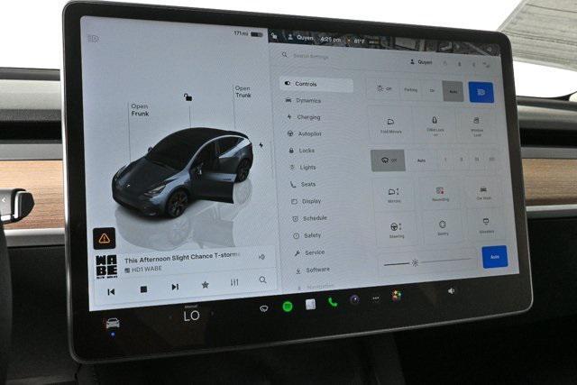 used 2023 Tesla Model Y car, priced at $32,700