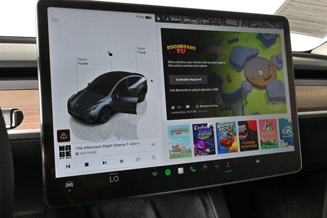 used 2023 Tesla Model Y car, priced at $32,700