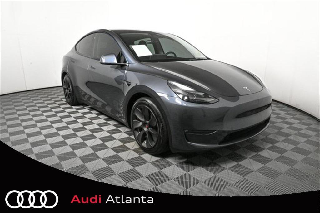 used 2023 Tesla Model Y car, priced at $32,700