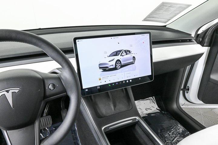 used 2024 Tesla Model Y car, priced at $37,495