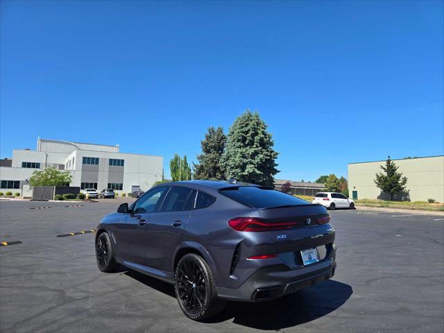 used 2022 BMW X6 car, priced at $55,990