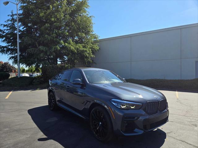 used 2022 BMW X6 car, priced at $55,990