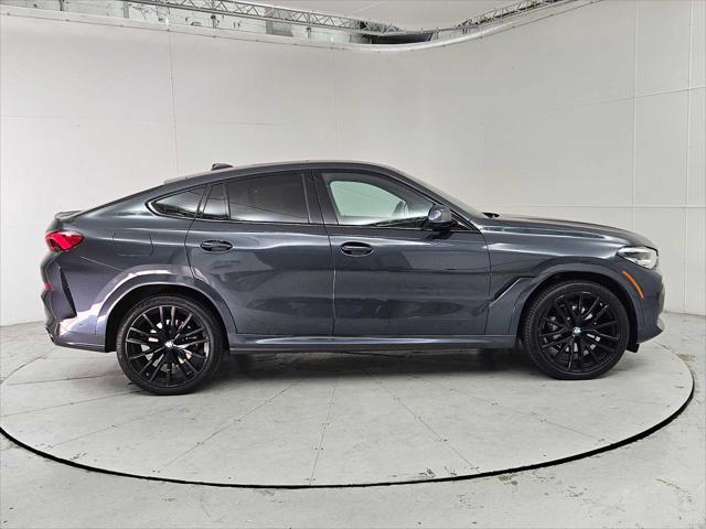 used 2022 BMW X6 car, priced at $55,557
