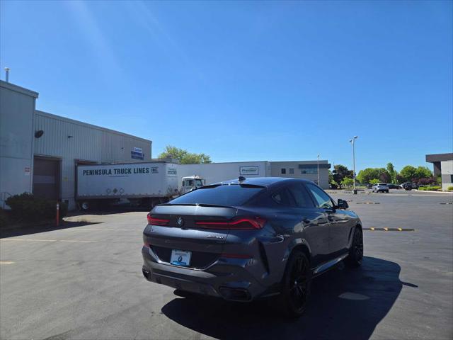 used 2022 BMW X6 car, priced at $55,990