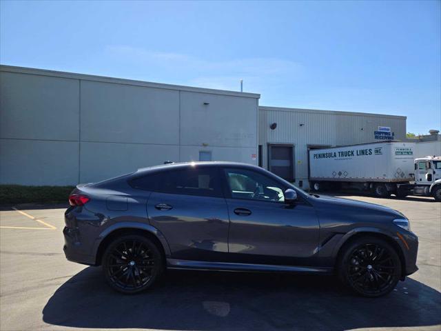 used 2022 BMW X6 car, priced at $55,990