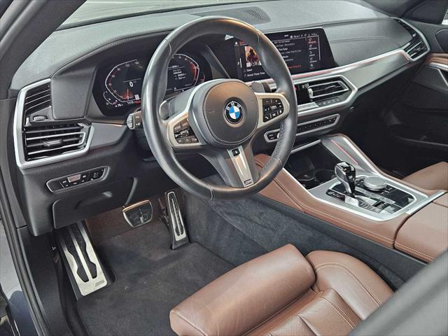 used 2022 BMW X6 car, priced at $55,557