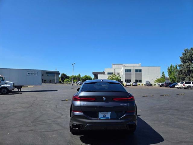 used 2022 BMW X6 car, priced at $55,990