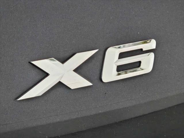 used 2022 BMW X6 car, priced at $55,557