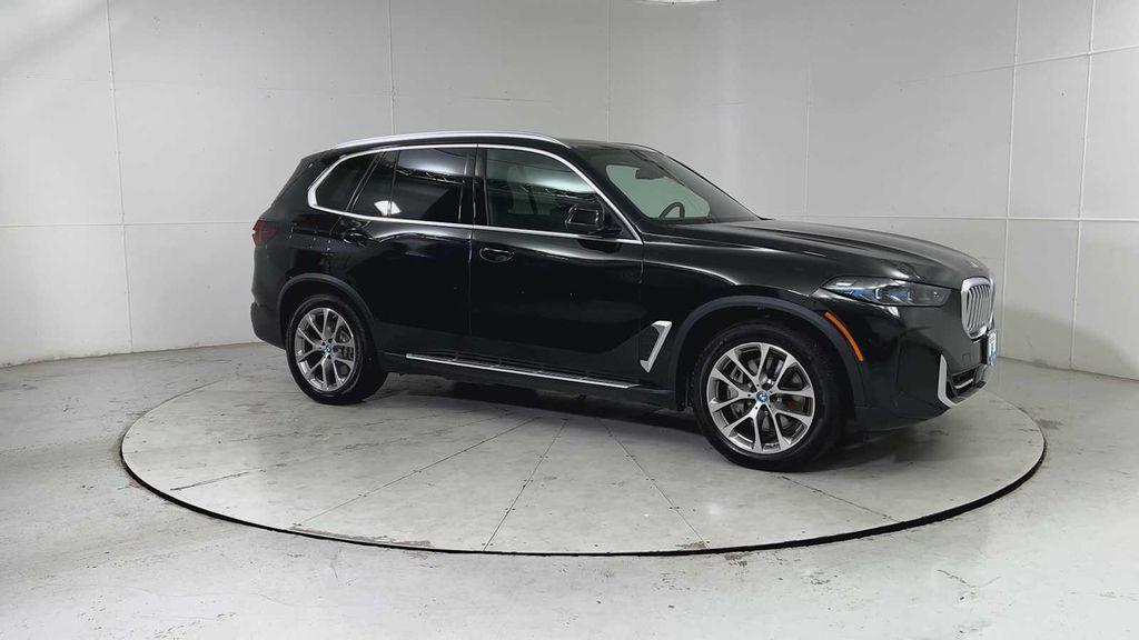 used 2025 BMW X5 PHEV car, priced at $66,603