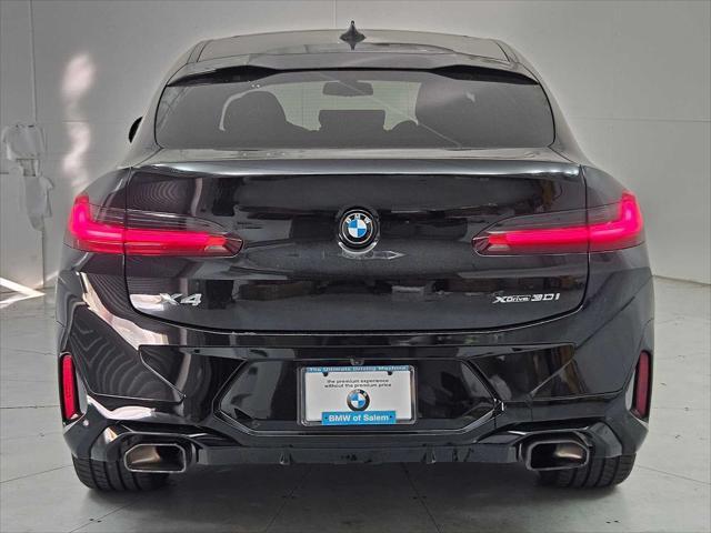 used 2025 BMW X4 car, priced at $56,297