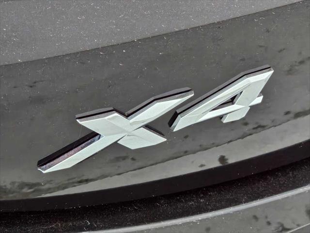 used 2025 BMW X4 car, priced at $56,297