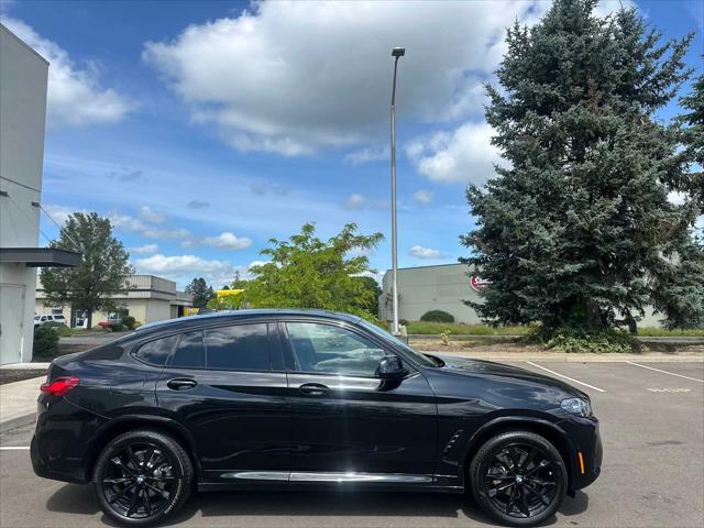used 2025 BMW X4 car, priced at $56,297