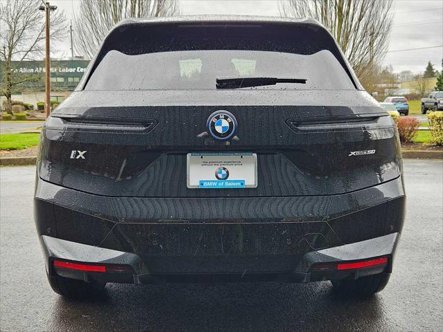 new 2025 BMW iX car, priced at $98,305