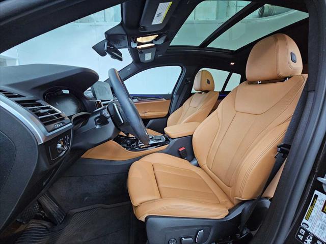 used 2025 BMW X4 car, priced at $52,999
