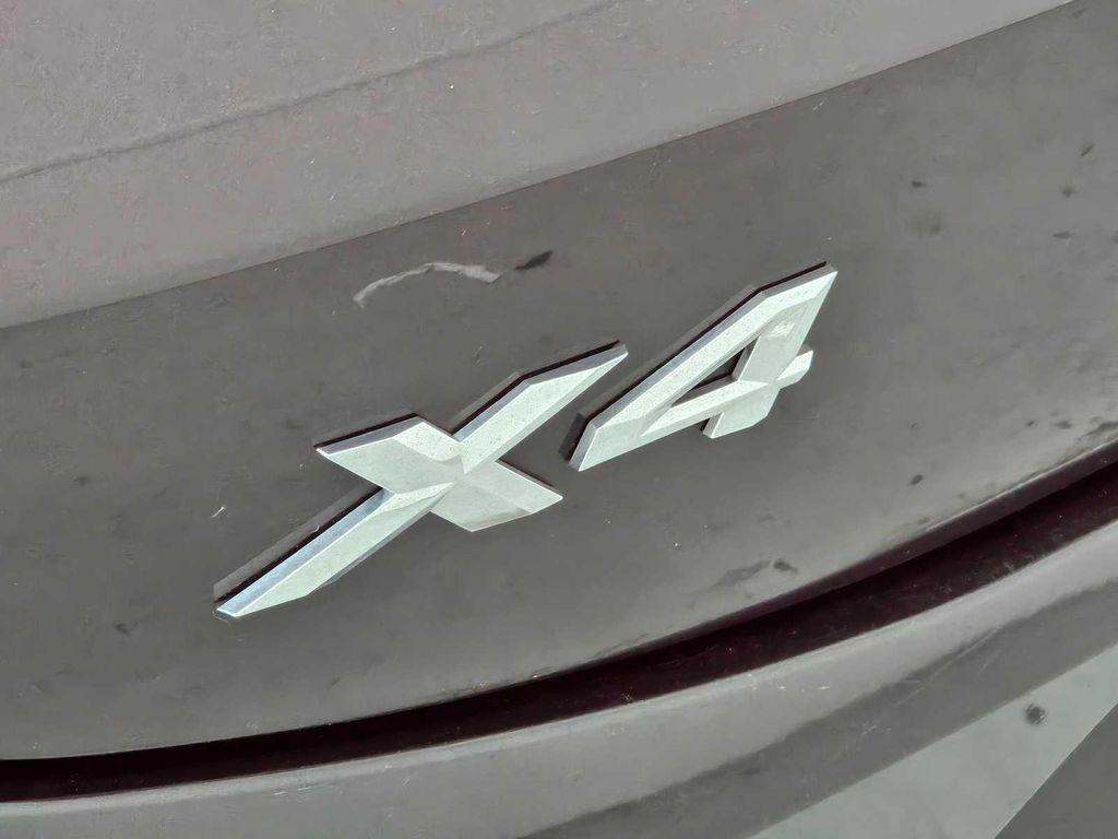 used 2025 BMW X4 car, priced at $47,500
