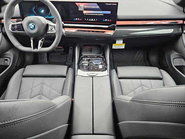 new 2025 BMW 550e car, priced at $79,175