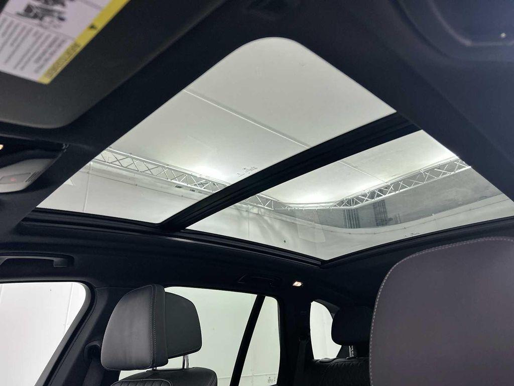 used 2025 BMW X5 PHEV car, priced at $59,577
