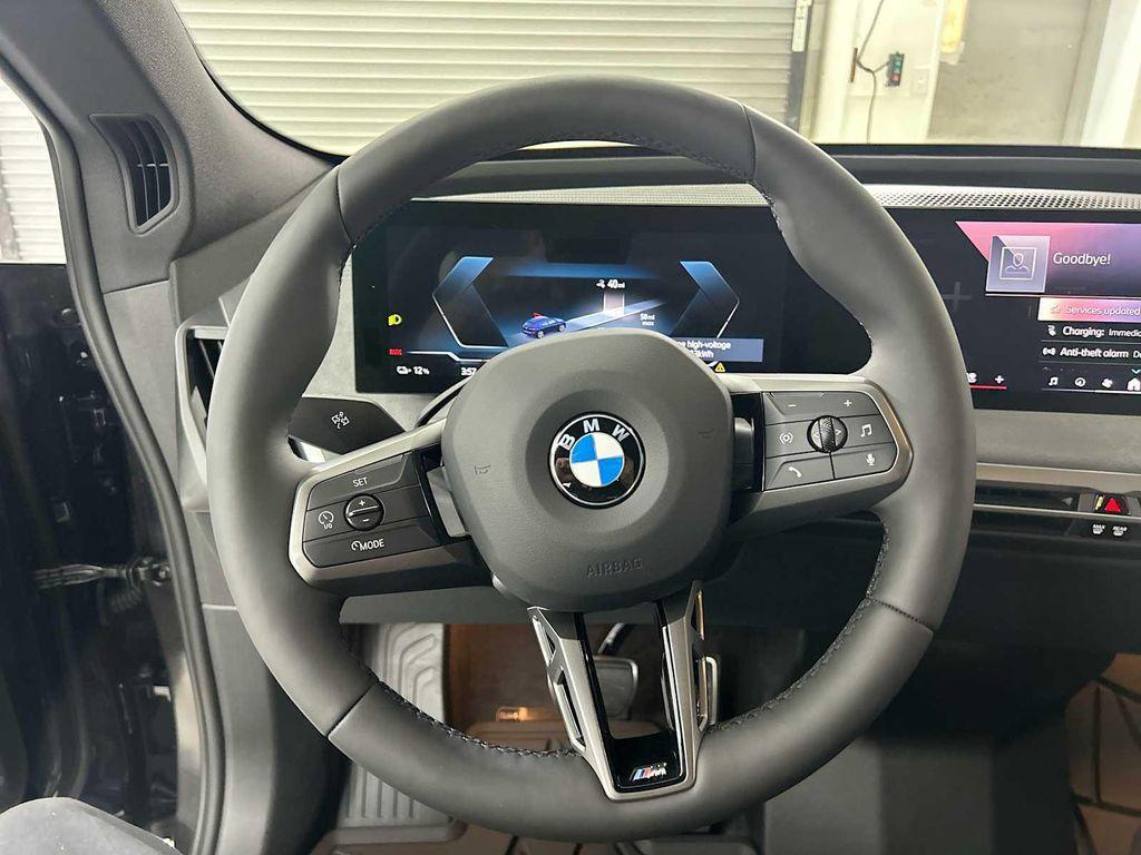new 2026 BMW iX car, priced at $96,871