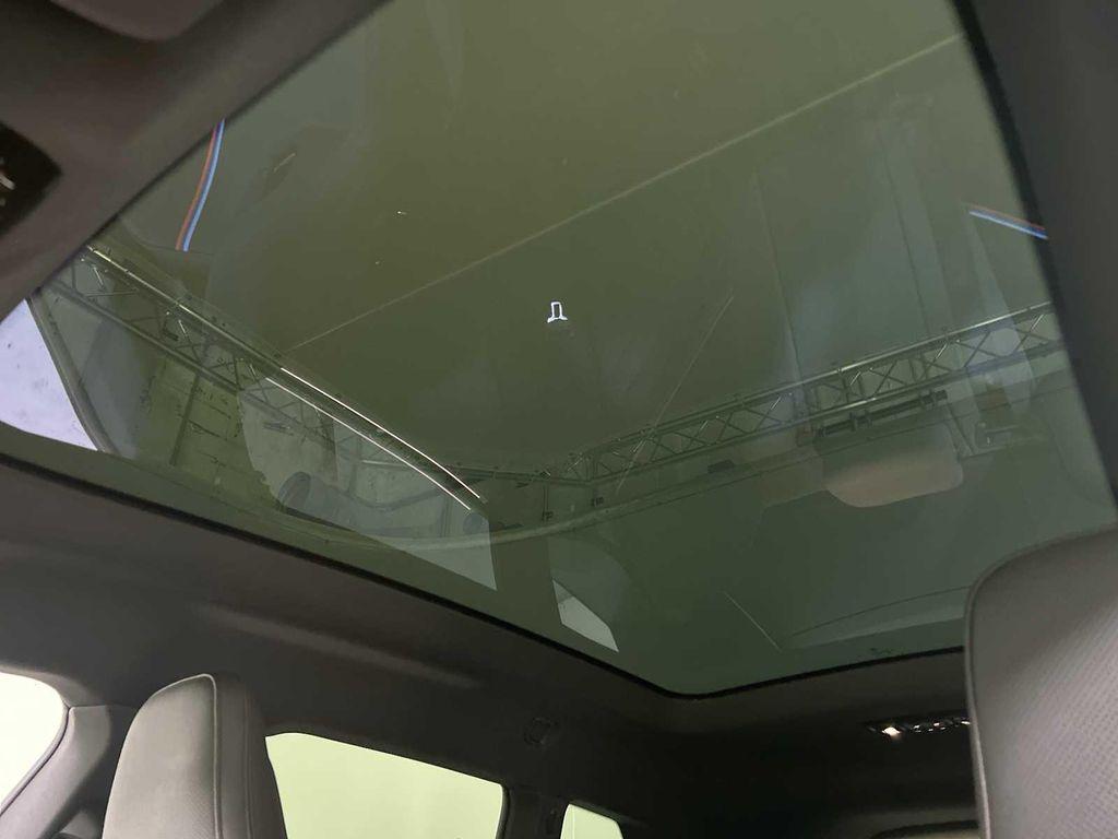 new 2026 BMW iX car, priced at $96,871