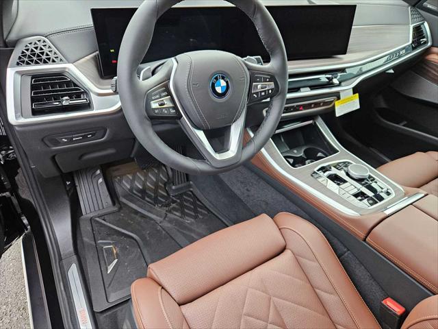 new 2025 BMW X5 PHEV car, priced at $82,435