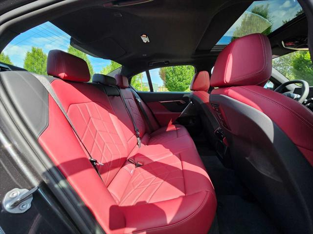 used 2024 BMW i5 car, priced at $61,190